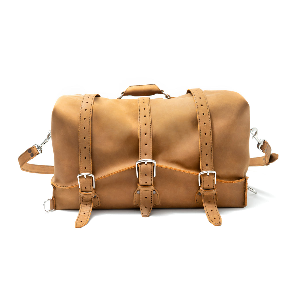 20" Waterbag in Tan, front view with three buckle straps, top handle and shoulder strap clips