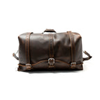 24" Waterbag in dark brown, front view with three buckle straps, top handle and shoulder strap