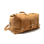 24" Waterbag in tan, angled side view showing the end, buckle straps and top handle