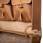 Grandfather Overnight Case in Tobacco, close-up of the open lid pockets with toggle ties and the lid stay strap