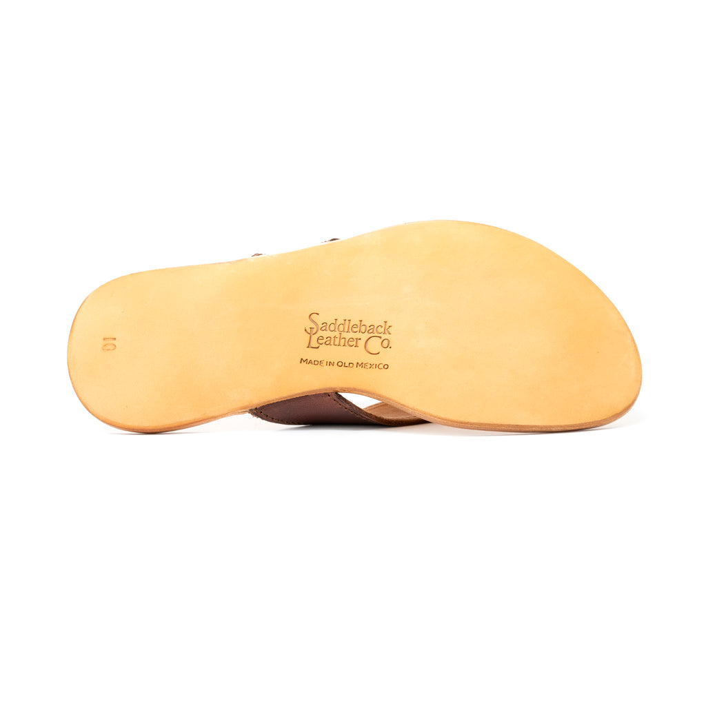 Flip Flops in Chestnut leather, sole underside with embossed Saddleback Leather Co. logo and size stamp