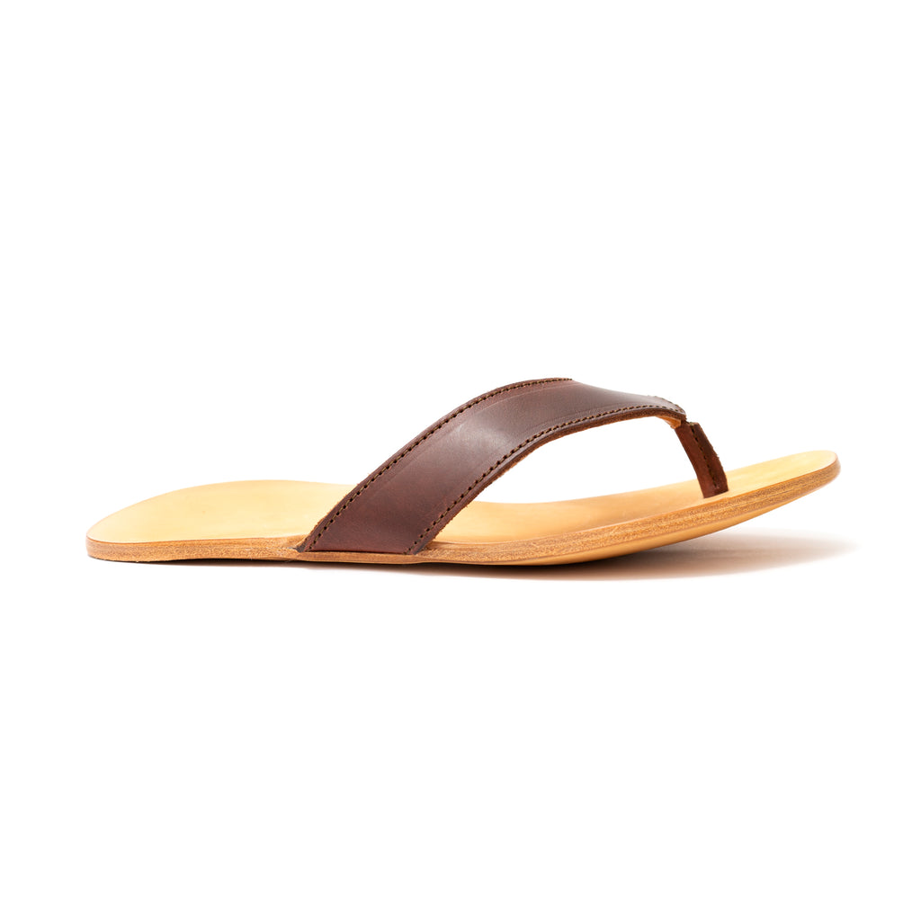 Single Flip Flop in Chestnut leather with natural footbed, inner side profile view