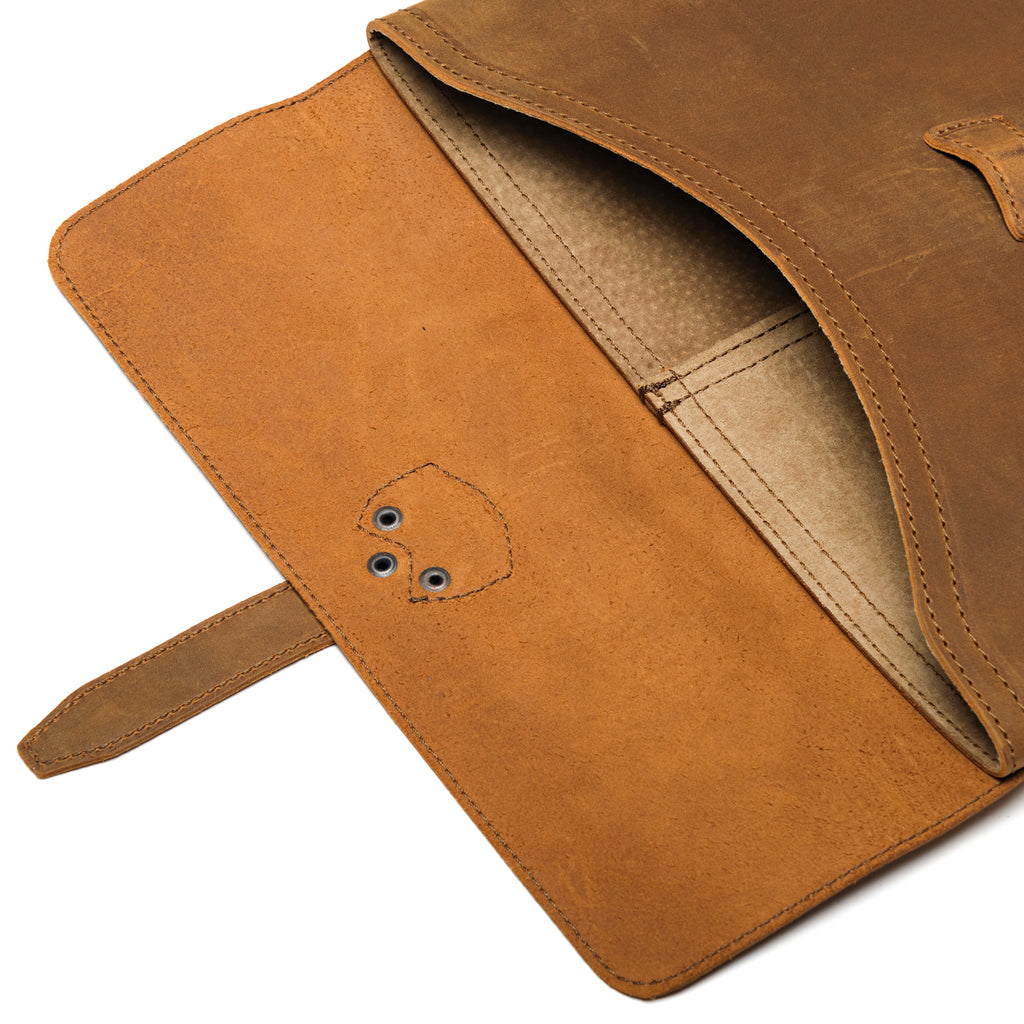 16" Document Holder in Tobacco with the flap open, close-up of the suede underside and tan interior