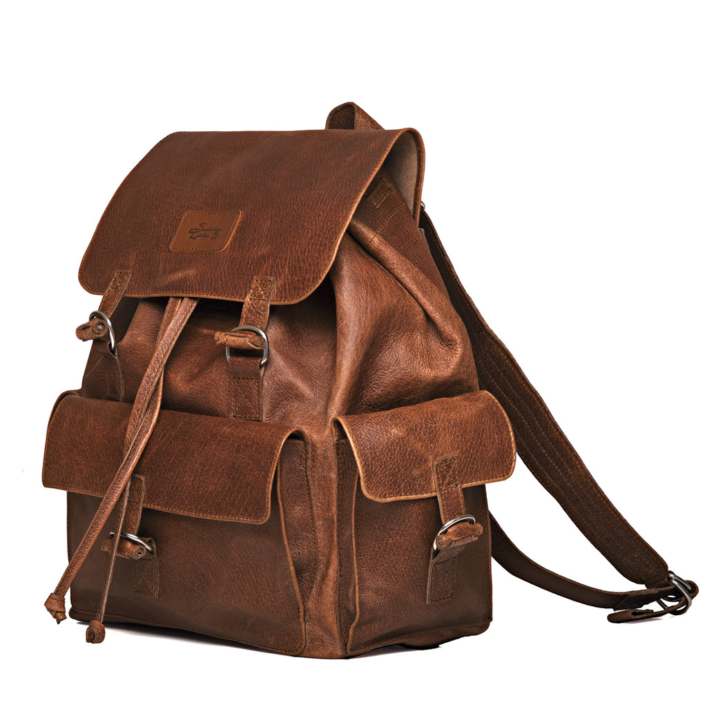 Large Travel Backpack in Burnt Sausage, angled front view with flap, front and side pockets