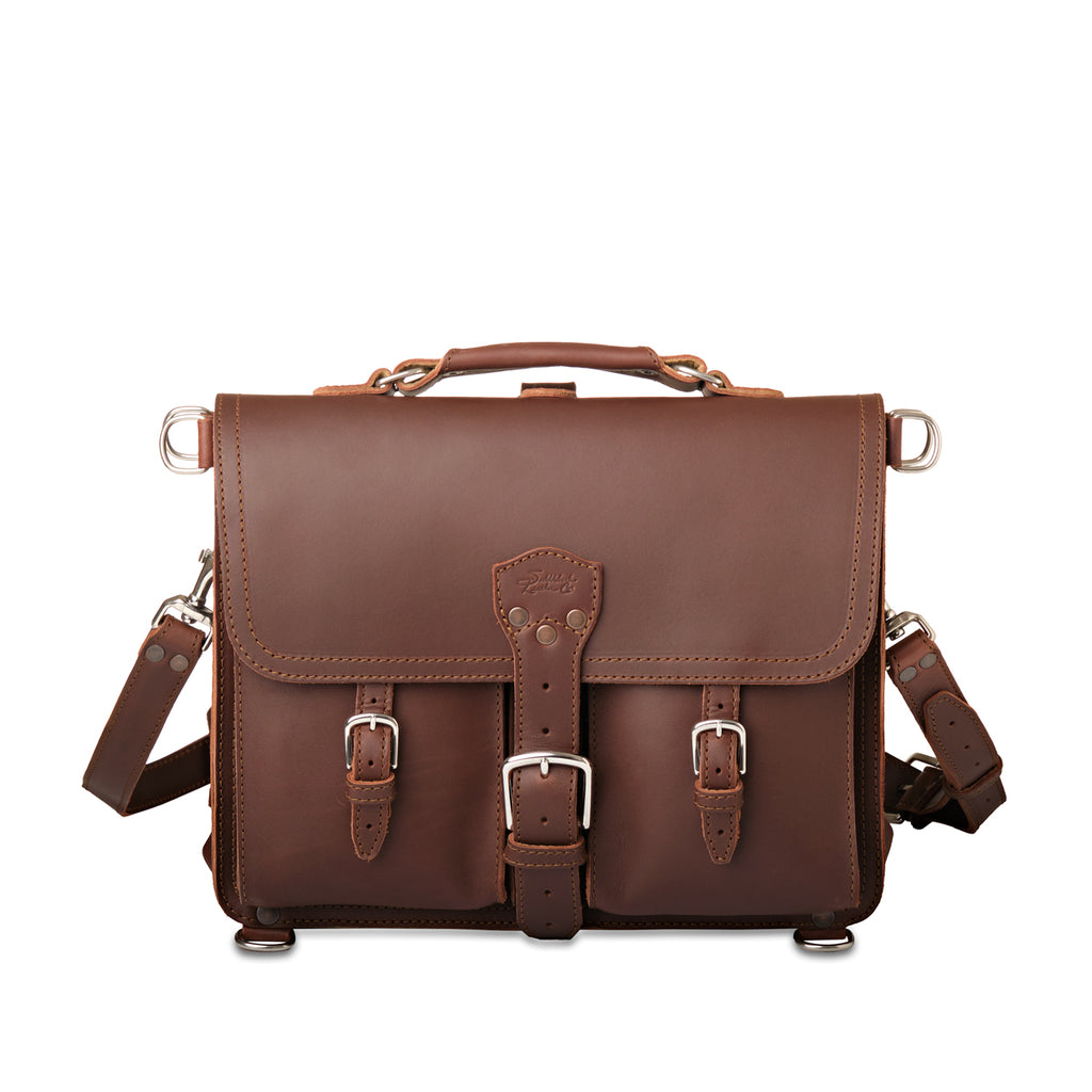 Thin Front Pocket Leather Briefcase in Chestnut, front view with two buckled front pockets and shoulder strap