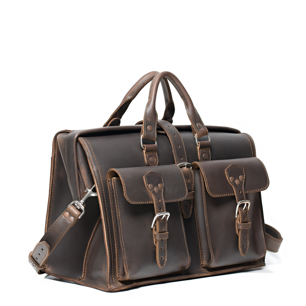 Barrister's Briefcase in Dark Coffee Brown, angled front view with top handles, two buckled front pockets and shoulder strap