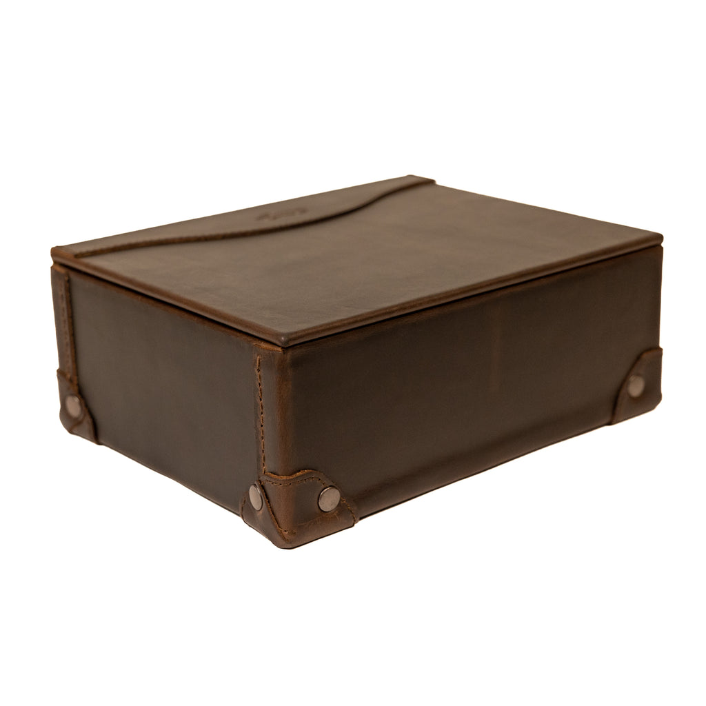 Leather Desk Box in Dark Coffee Brown, closed, angled view showing riveted leather corner guards