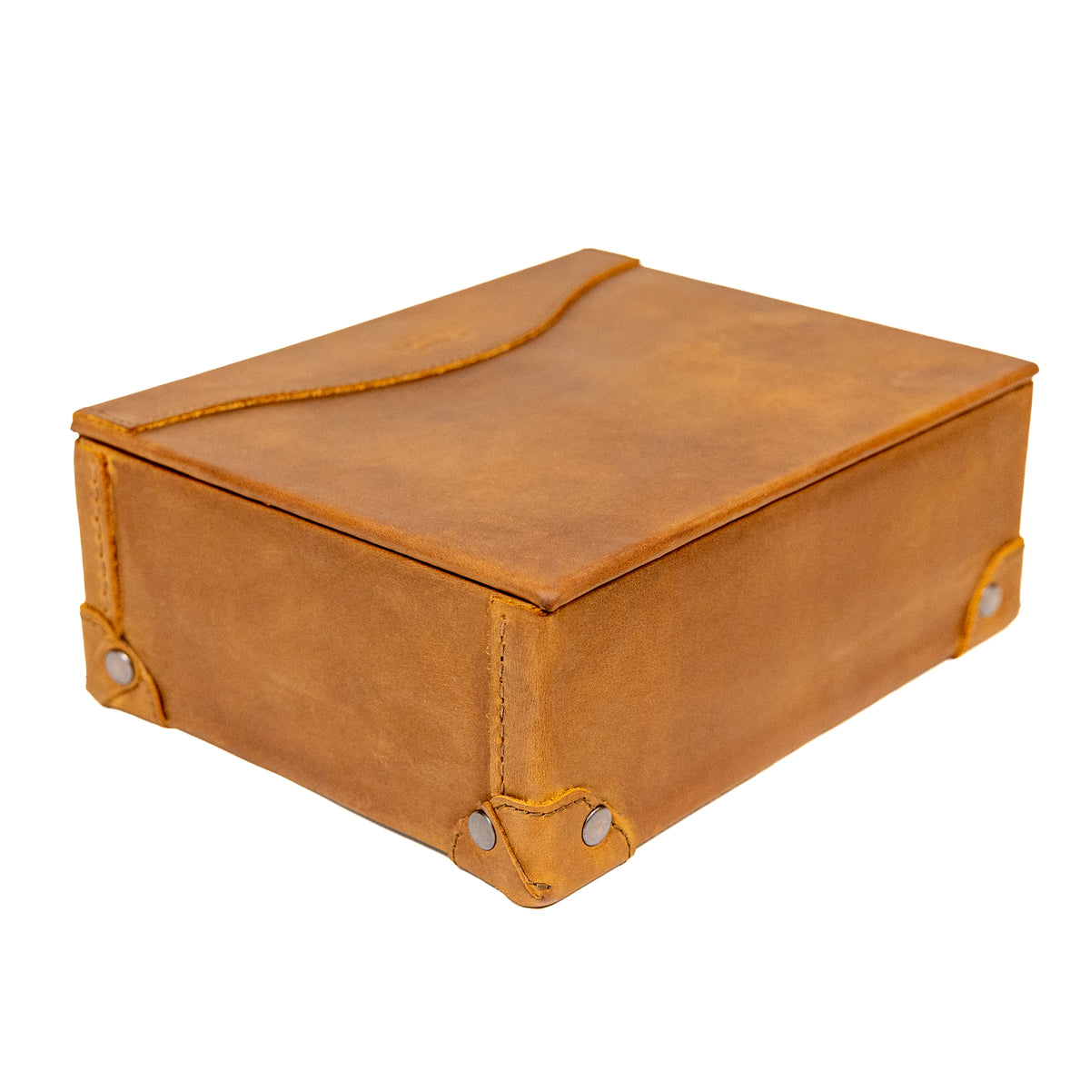Leather Desk Box in Tobacco, closed, angled view showing riveted leather corner guards