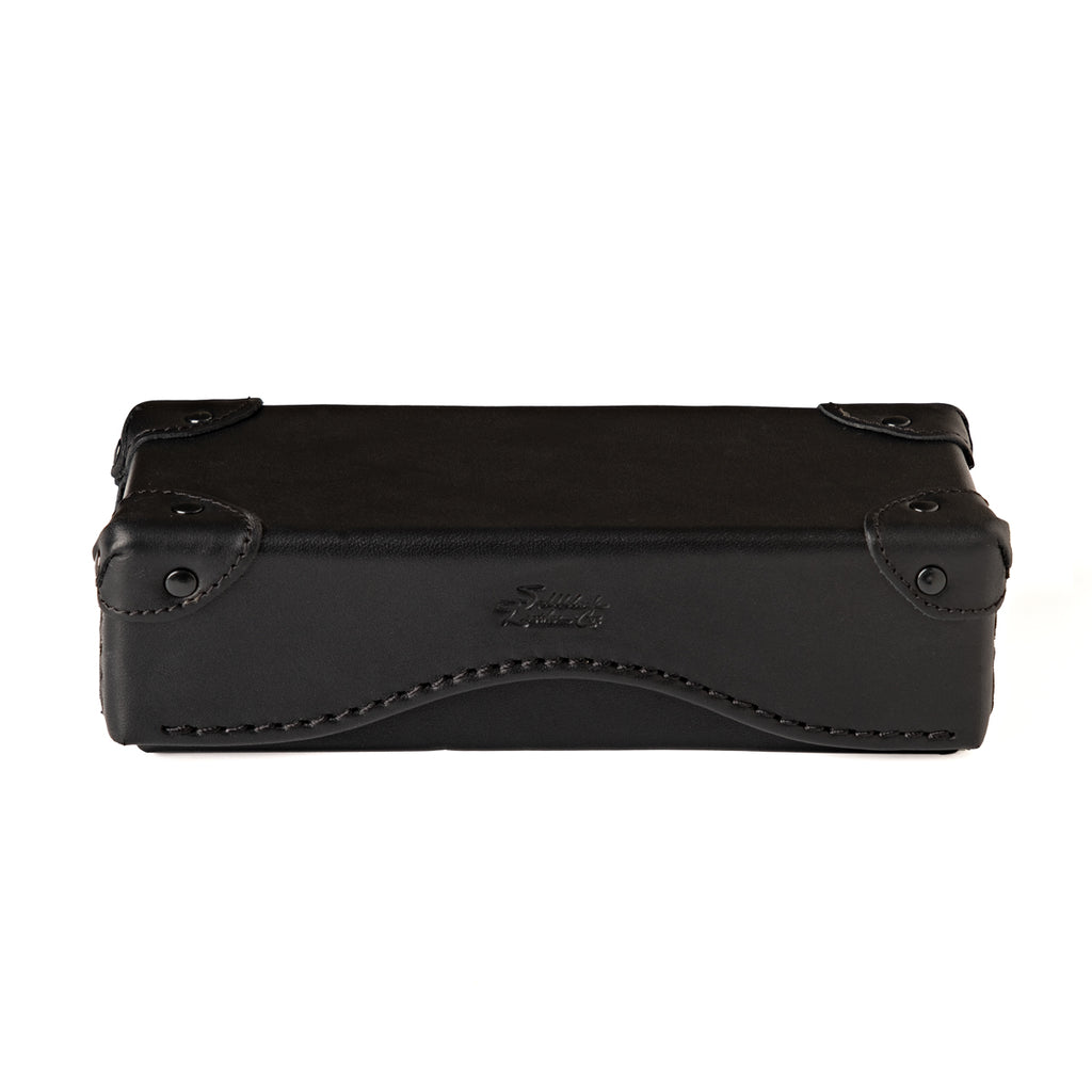 Grandfather Eyeglass Case in Black leather, closed front view with riveted corner caps and embossed logo