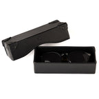 Grandfather Eyeglass Case in Black leather, open with a pair of round sunglasses inside and lid beside it