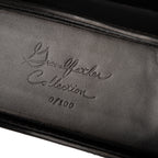 Grandfather Eyeglass Case in Black leather, close-up of embossed Grandfather Collection script and edition number
