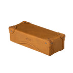 Grandfather Eyeglass Case in Tobacco leather, closed angled view with riveted corner caps and embossed logo