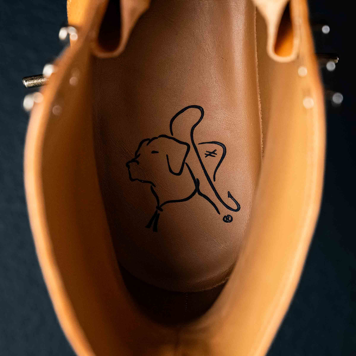 Officer's Boot in English Tan, view inside showing the leather insole with the dog logo