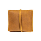 Auto Organizer Set leather organizer bag in Tobacco, front view closed with the leather wrap strap