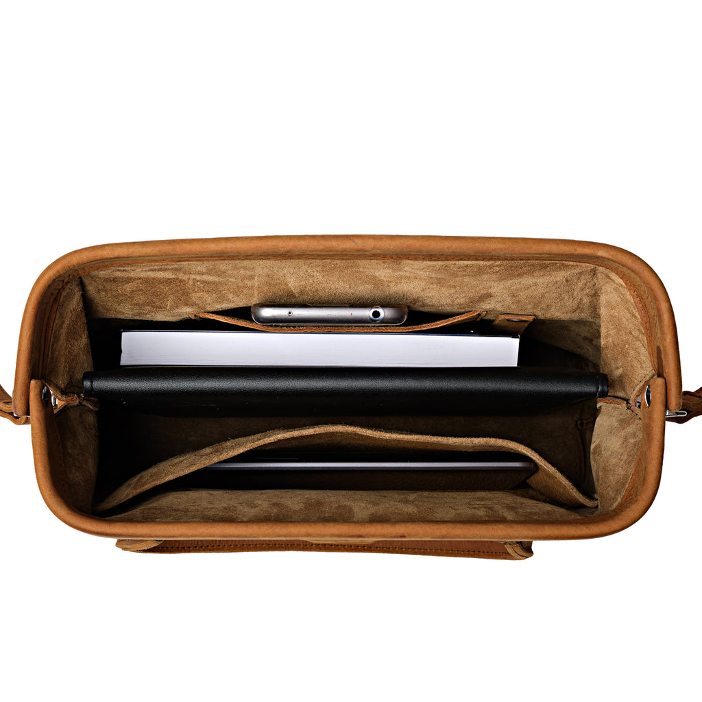 Everyday Purse in Tobacco, top view open showing suede lining and interior pockets holding a phone, notebook and tablet
