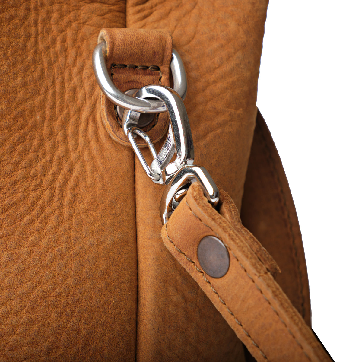 Everyday Purse in Tobacco, close-up of the side ring and swivel clip attaching the shoulder strap