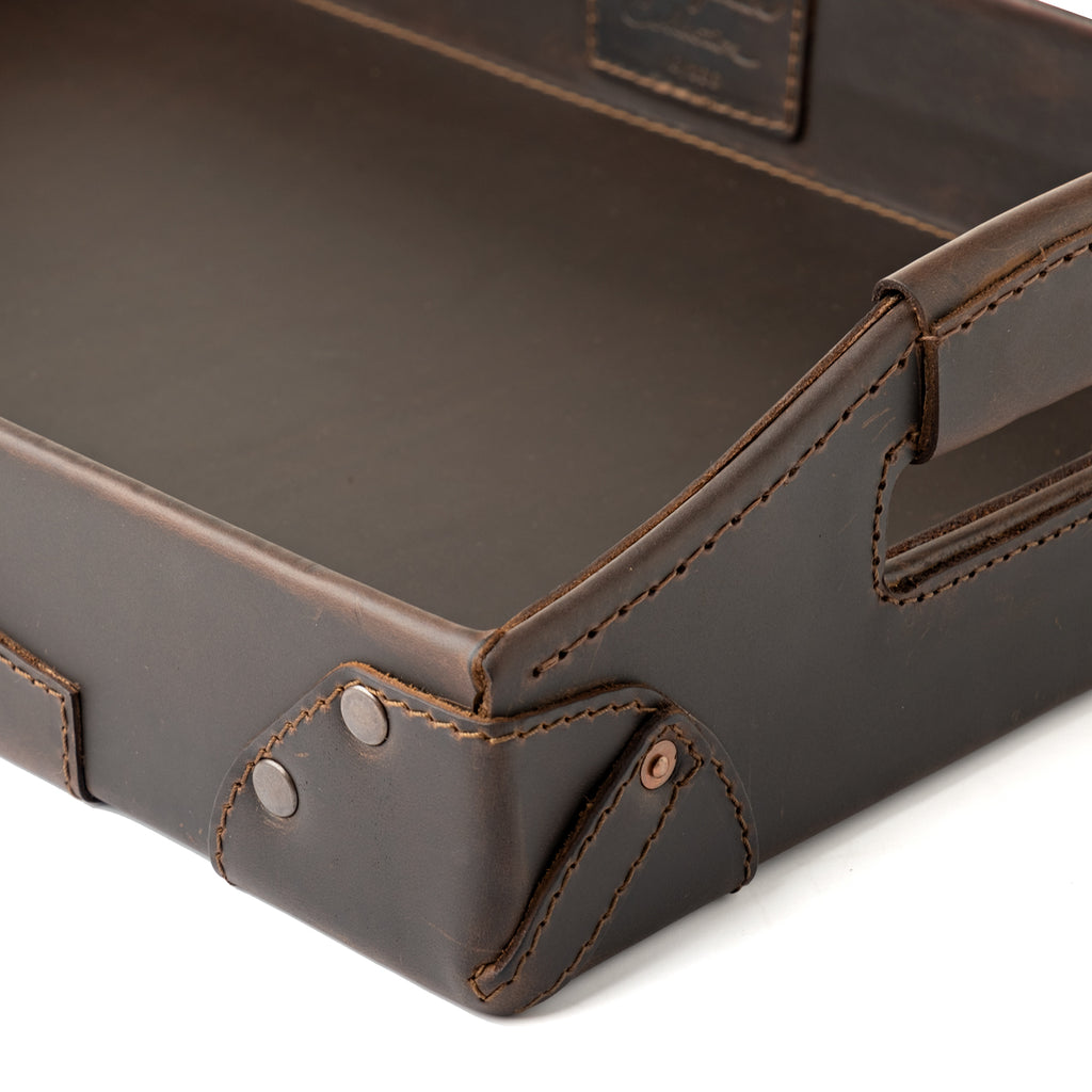 Grandfather Serving Tray in Dark Coffee Brown leather, close-up of riveted corner, stitching and handle