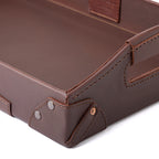 Grandfather Serving Tray in Chestnut leather, close-up of riveted corner, stitching and handle