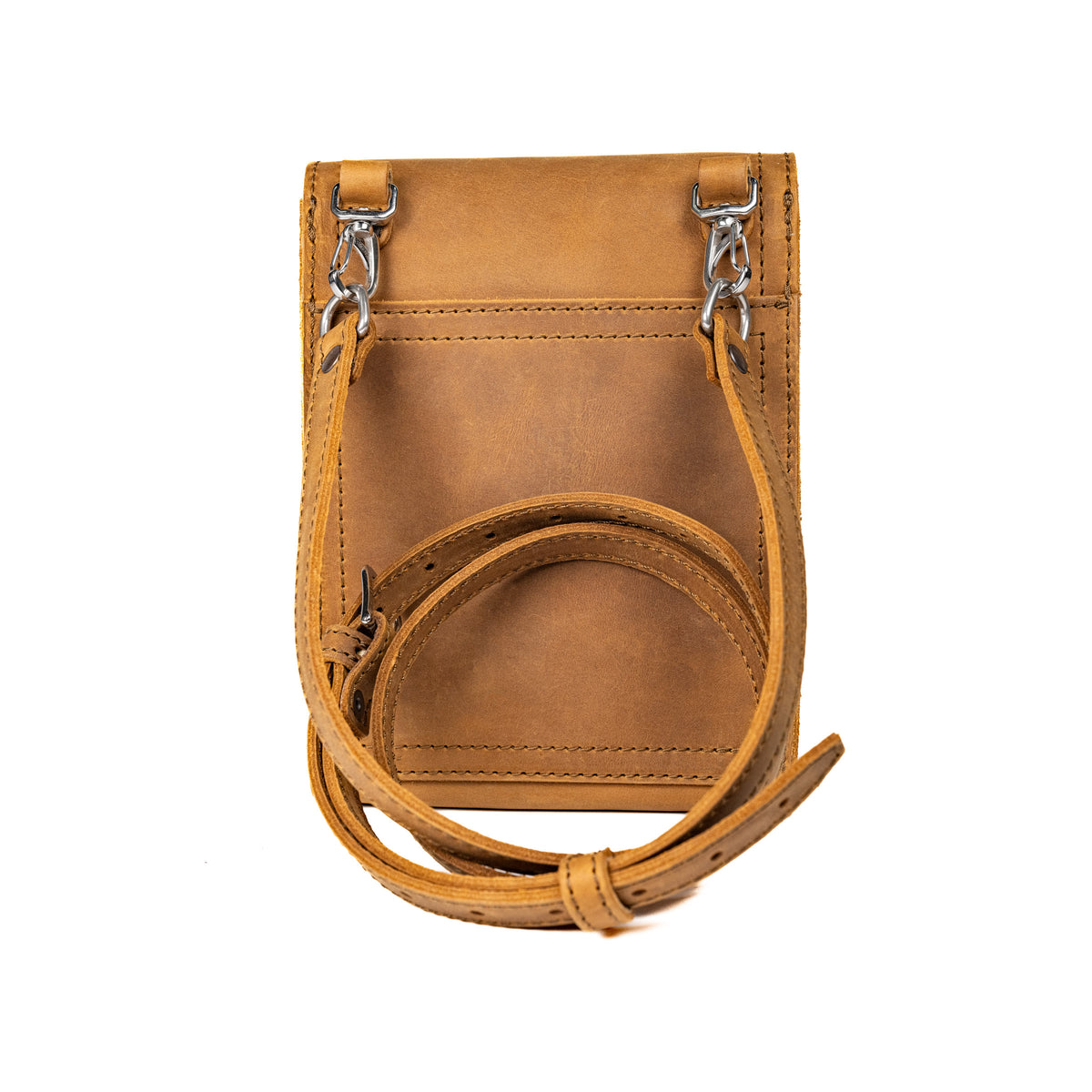 Leather Travel Satchel in Tobacco, back view with removable shoulder strap clipped to swivel hooks