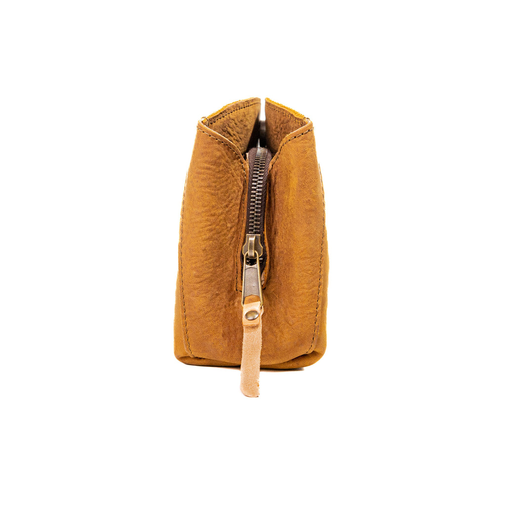Leather Organizer Clutch in Tobacco, side view showing the zipper and leather pull tab