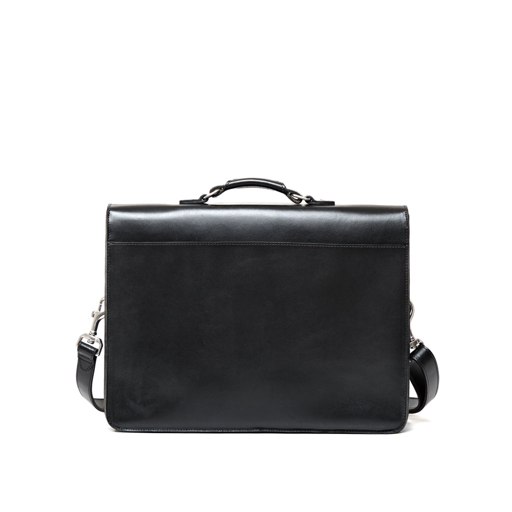 Livingstone Briefcase in Raven Black, back view with top handle and shoulder strap clips