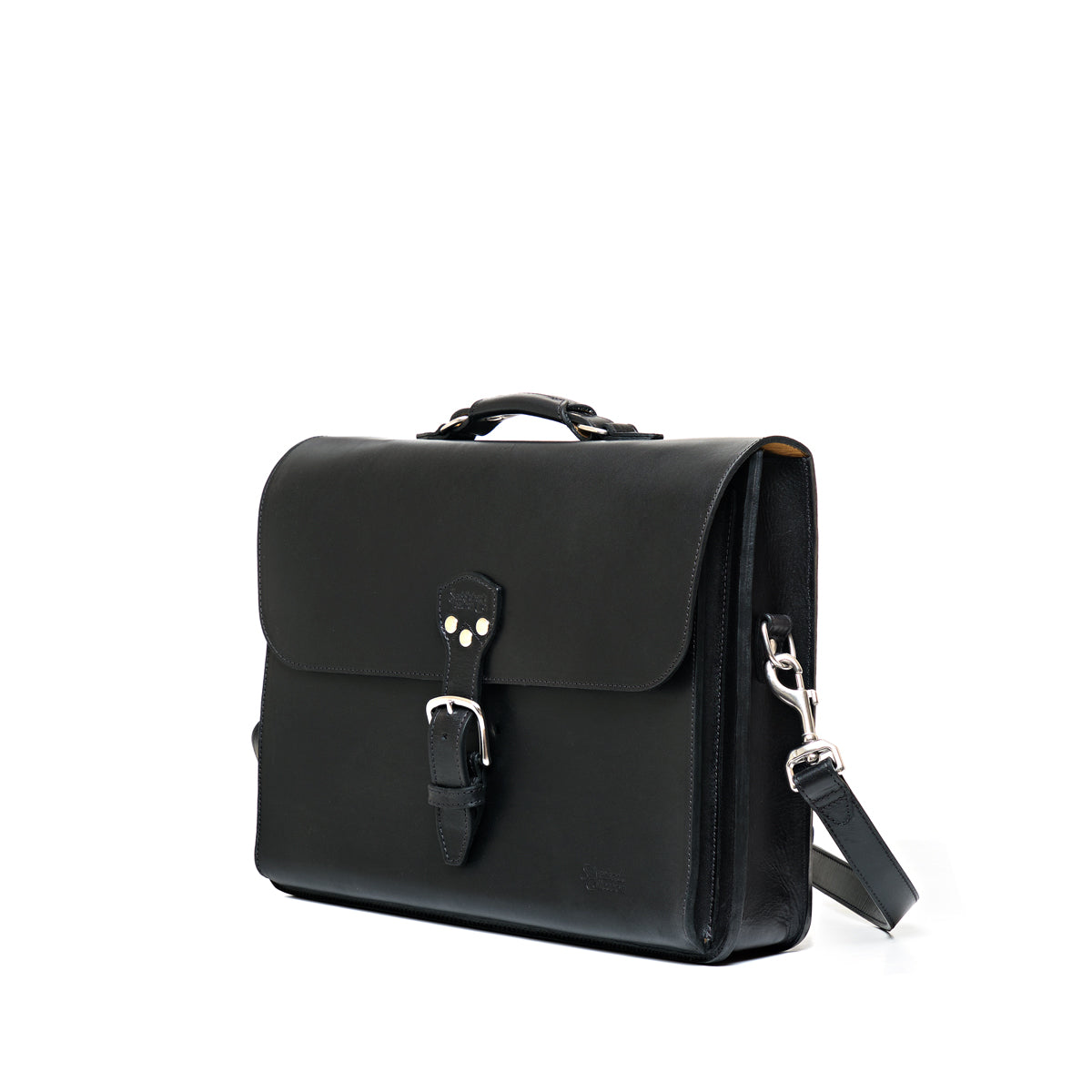 Livingstone Briefcase in Raven Black, angled side view showing the buckled flap and shoulder strap clip