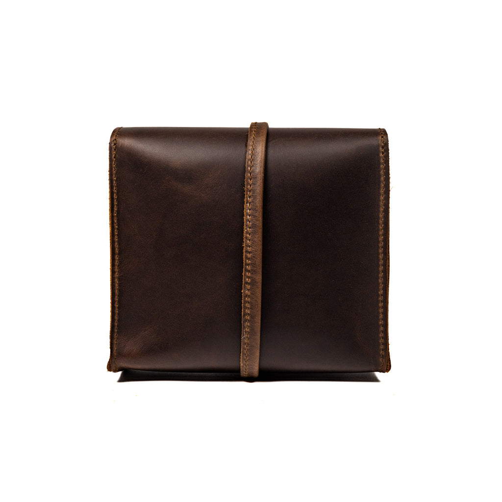 Leather Organizer Bag in Dark Coffee Brown, back view showing the vertical leather strap