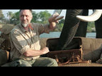 African Elephant Eats out of Deep Pocket Leather Duffle Bag in Zambia