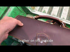 Thin Front Pocket Leather Briefcase. A Laptop Bag description with Pelicans and Storks in Gabon
