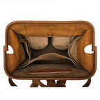 Big Mouth Leather Backpack in Tobacco, top view of the wide-open mouth showing interior pockets