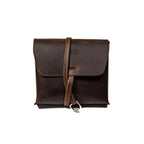 Leather Organizer Bag in Dark Coffee Brown, straight-on front view with flap closure and strap looped through a ring