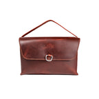 Large Leather Organizer Bag in Chestnut, tie looped up as a carry handle, metal ring on the closed flap