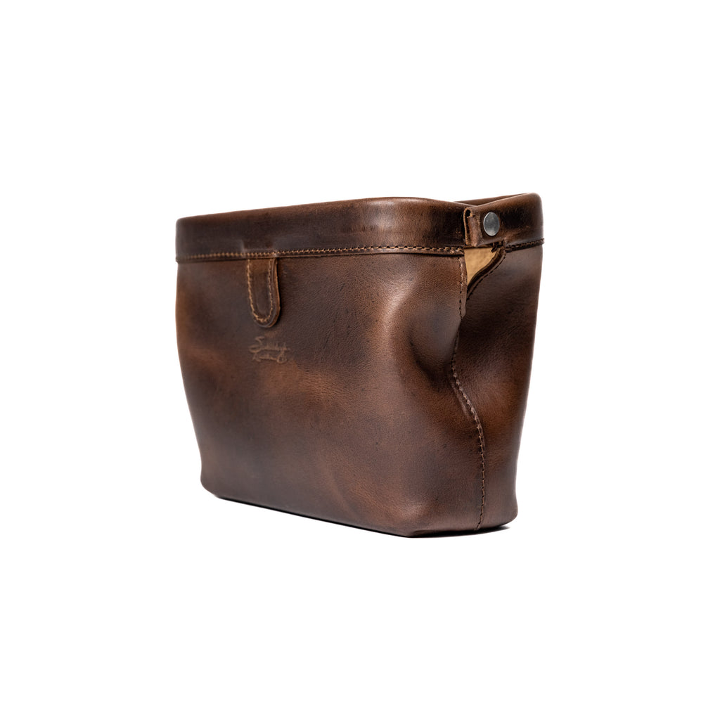 Big Mouth Organizer in Dark Coffee Brown, angled side view showing the hinged frame and rivet