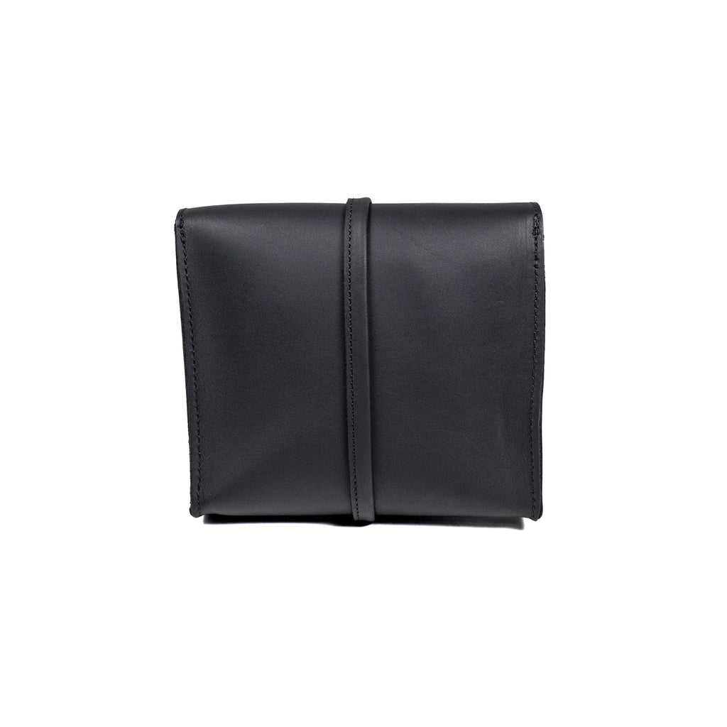 Leather Organizer Bag in Black, back view showing the vertical leather strap