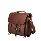 Thin Front Pocket Leather Briefcase in Chestnut, angled front view with two buckled front pockets and shoulder strap