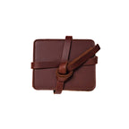 Leather Coaster Set in Chestnut, stacked coasters wrapped and knotted with a leather tie
