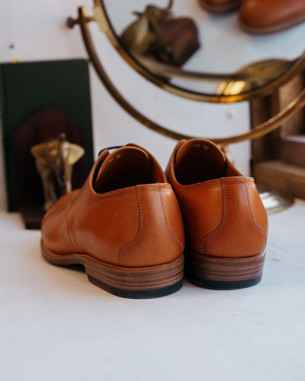Toe Cap Shoes in English Tan, back view of the pair showing heel counters and stacked heels