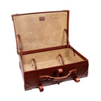 Grandfather Suitcase in Chestnut, opened to show the canvas lining and leather tie-down straps