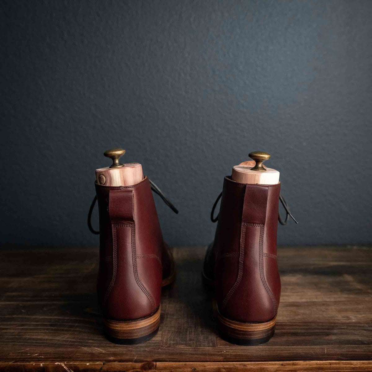 Officer Boot in Oxblood, back view of pair showing heel counters and stacked leather heels