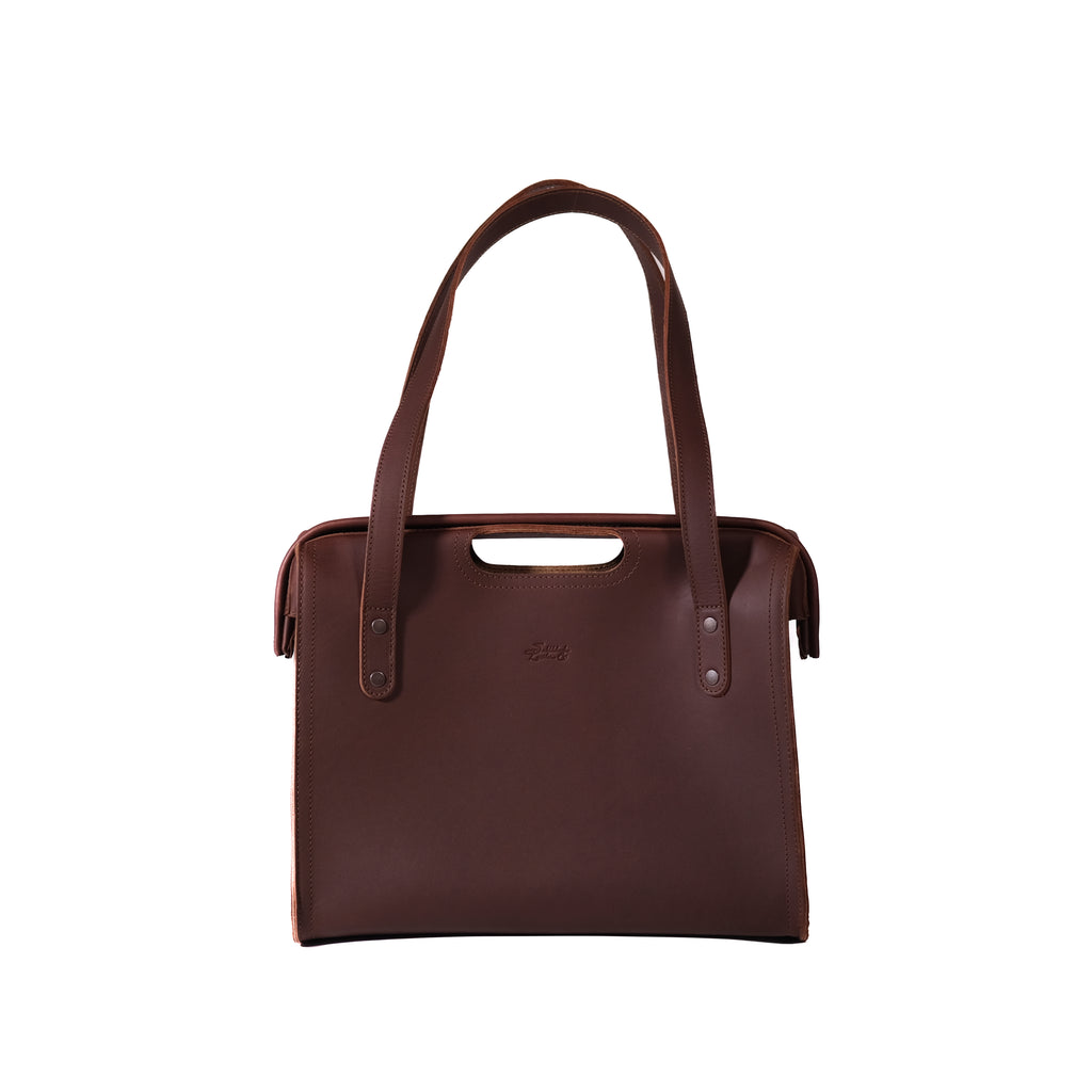 Professional Leather Tote in Chestnut, back view with embossed logo, shoulder handles and cutout grip