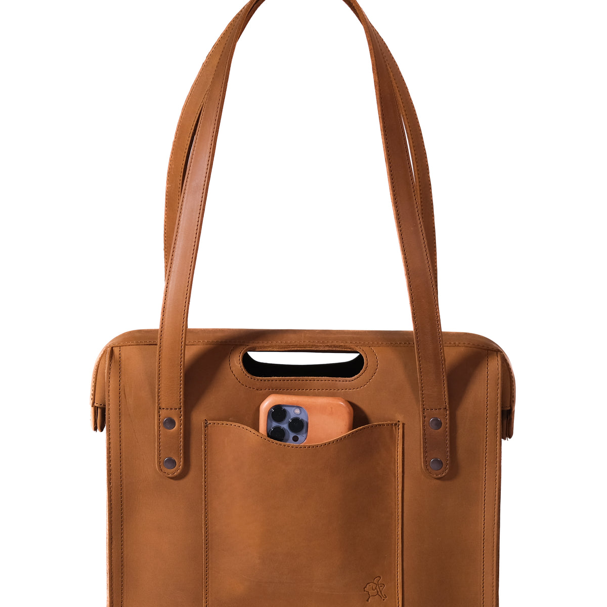 Professional Leather Tote in Tobacco, close-up front view of shoulder handles and a phone in the front pocket