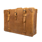 Grandfather Suitcase in Tobacco, angled front view with buckle straps and riveted corner caps