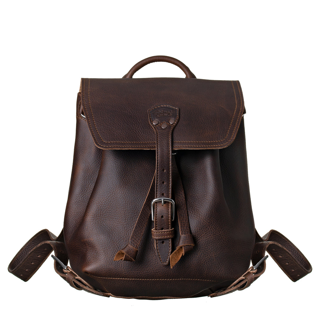 12" Drawstring Backpack in Dark Coffee Brown, front view with buckled flap and drawstring ties