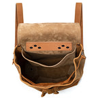 12" Drawstring Backpack in Tobacco, top view open and empty showing interior pockets and suede lining