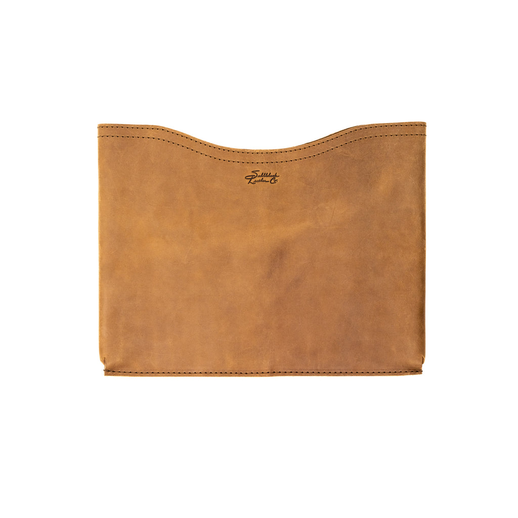 Auto Organizer Set leather seat gap filler in Tobacco, front view of the curved-top sleeve with small logo