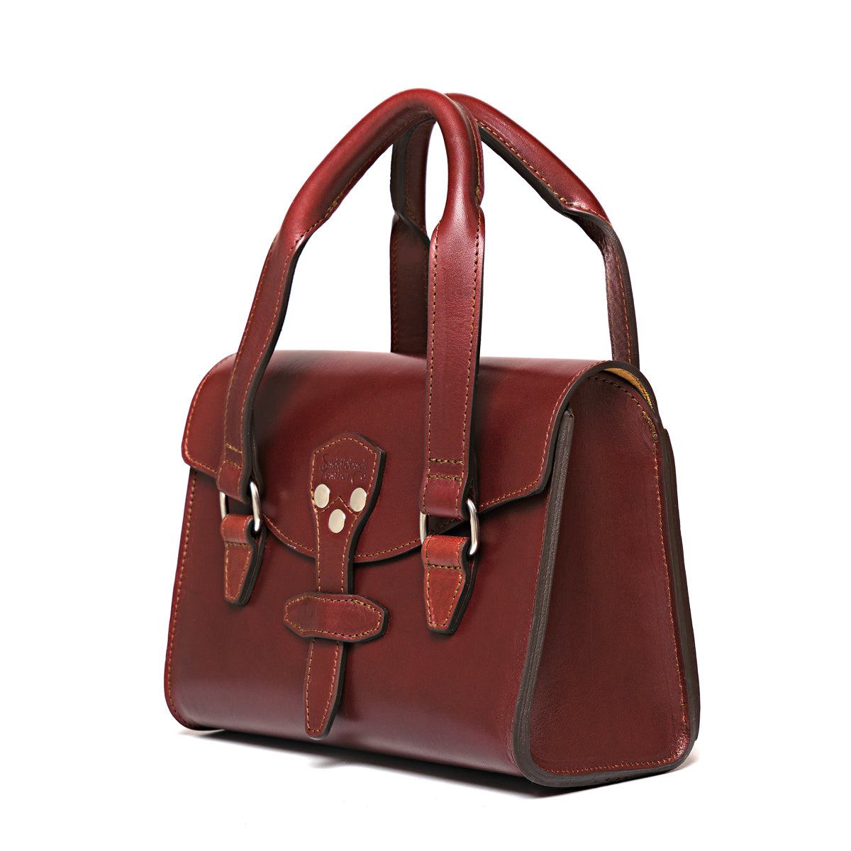 Double Handle Purse-Silverback in Oxblood, angled front view with twin top handles and strap closure