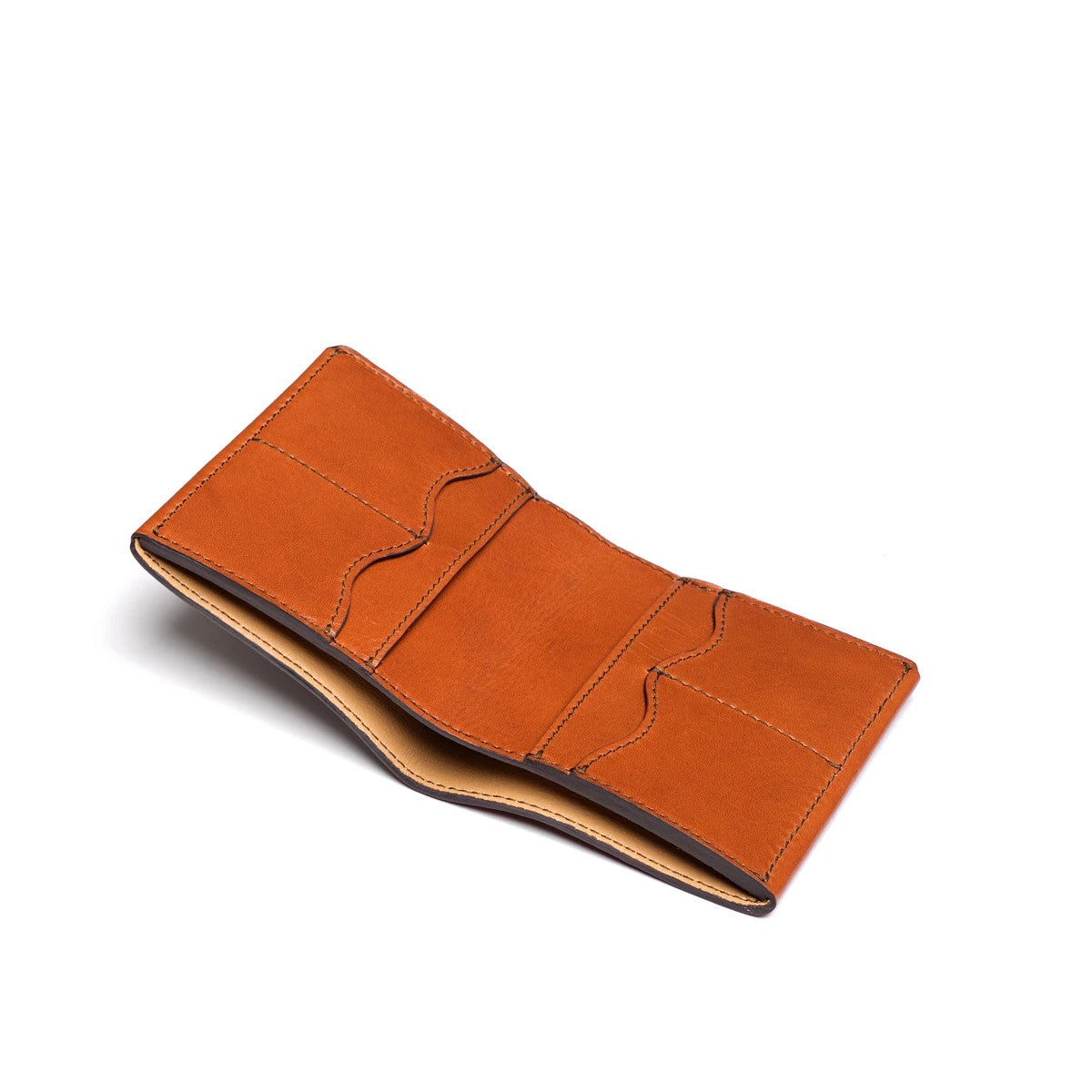 Large Bifold Wallet-Silverback in English Tan, open angled view of the empty card slots and goatskin lining