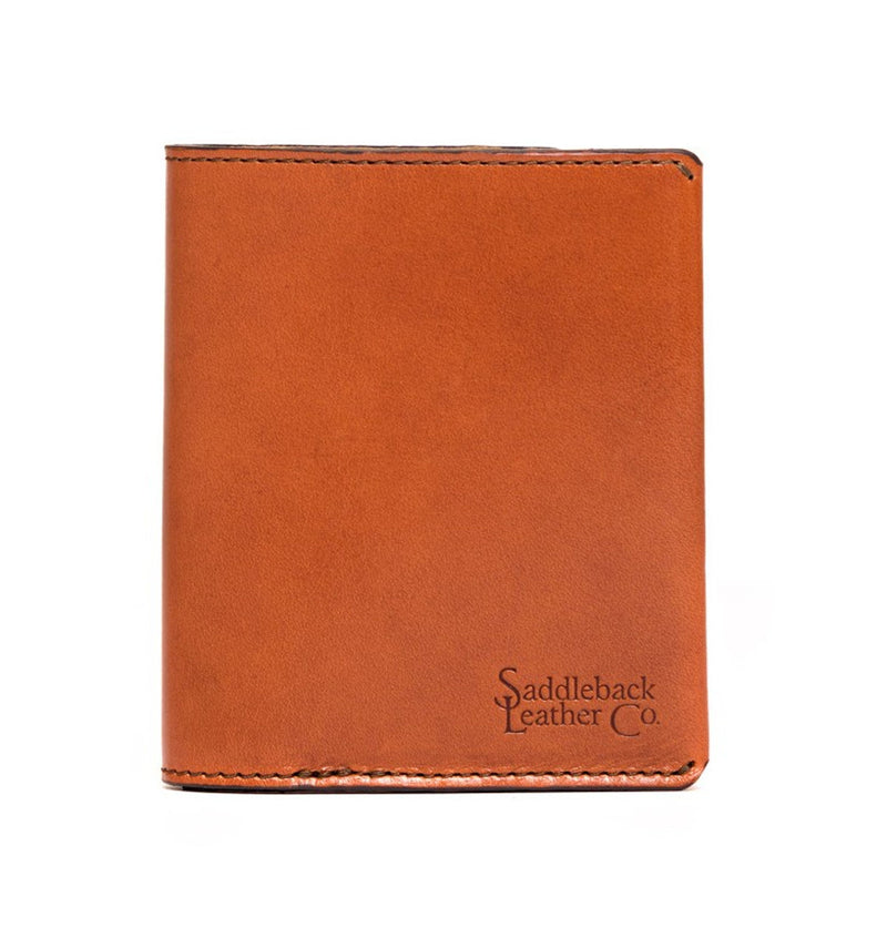 Closed tan leather bifold wallet standing taller than it is wide, with visible edge stitching.