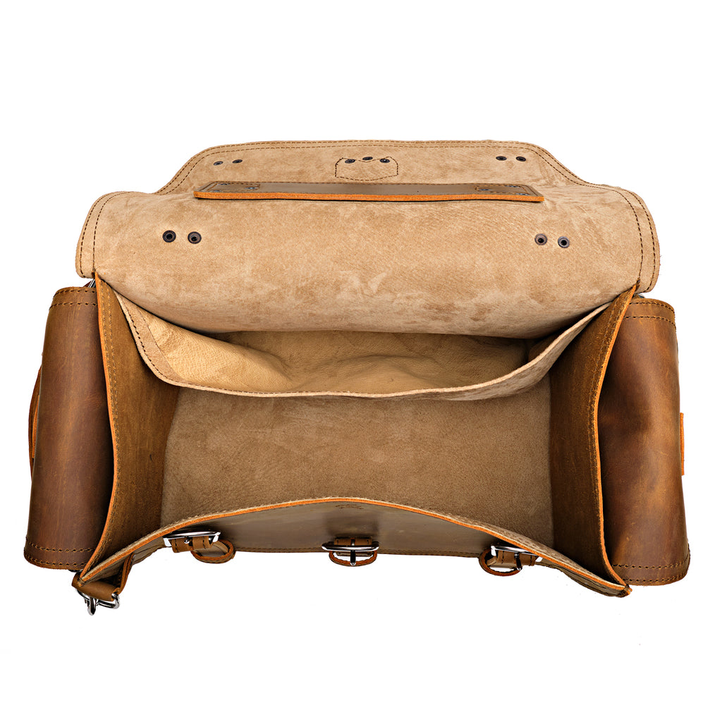 Side Pocket Leather Duffle in Tobacco, top view open showing the suede-lined interior and slip pocket