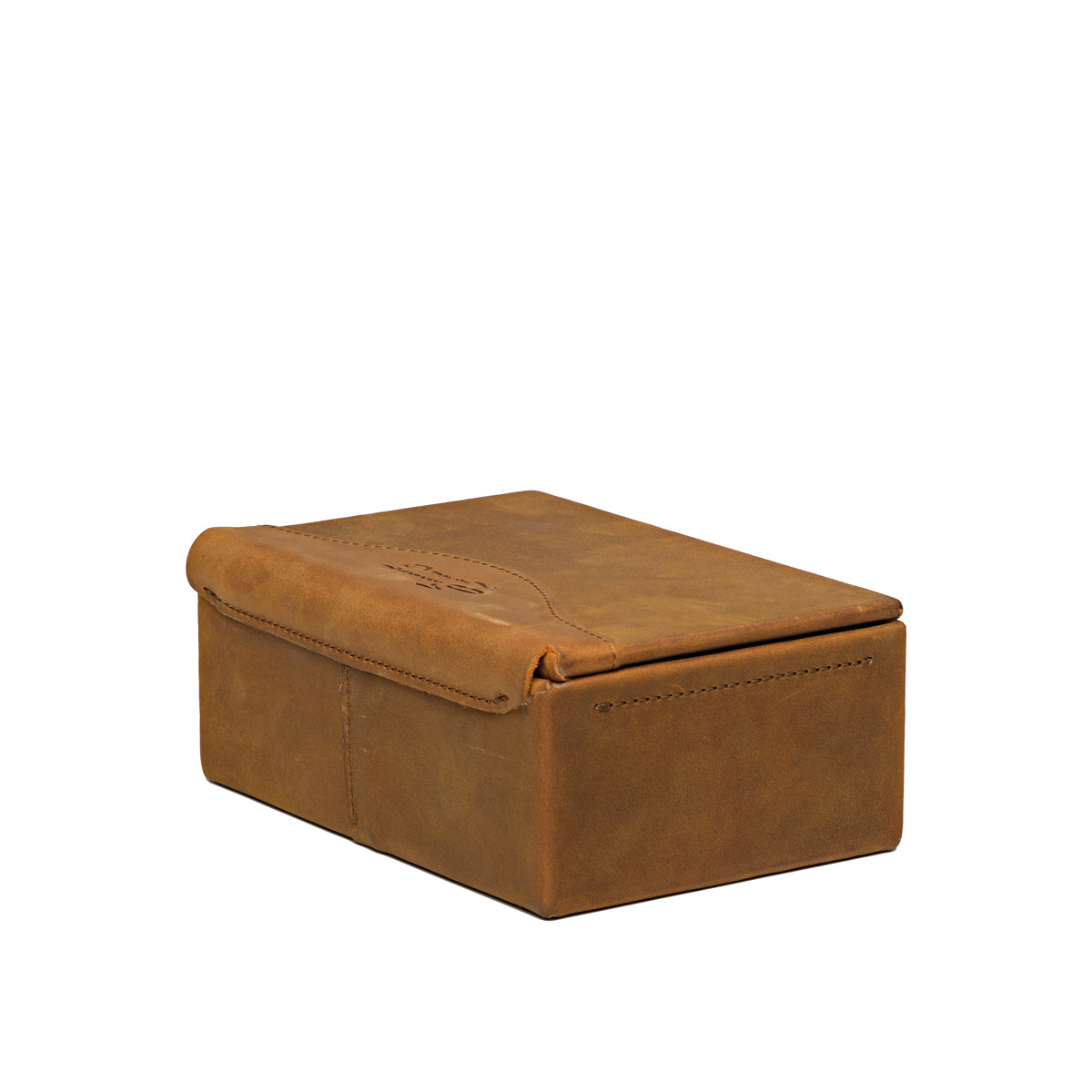 Small Organizer Box in Tobacco, closed, angled back view showing the lid hinge and stitched seams